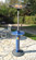 Outdoor bar table with infrared heating and display pole